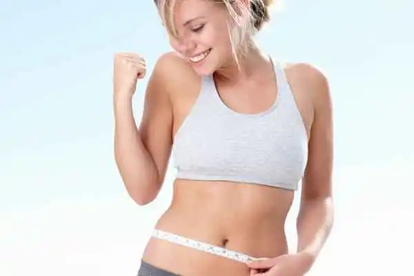 woman happy after fat reduction treatment Wimbledon