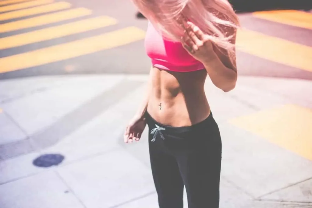 Woman with toned stomach after LA-EMS Body Sculpting Treatment Wimbledon